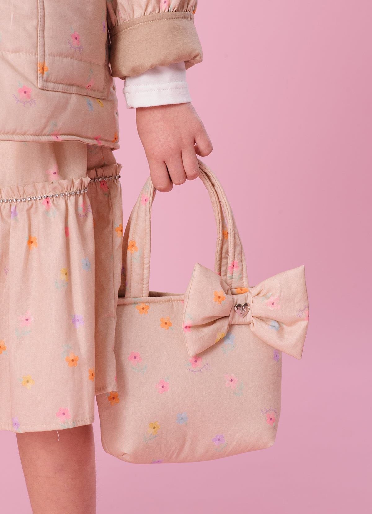 Bolsa Puffer Estampada Laço