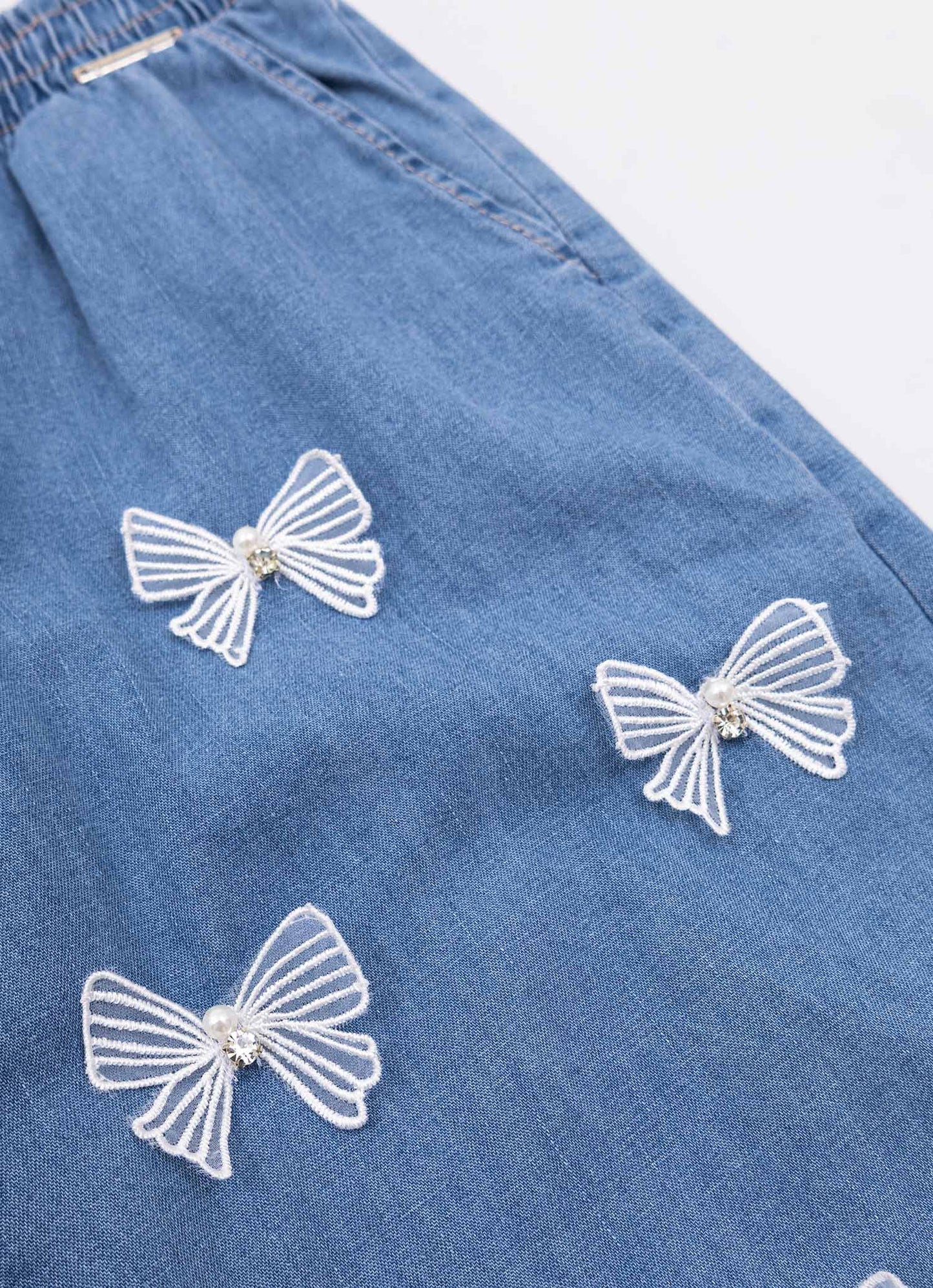 Calça Reta Jeans Fino Laços Aplicados