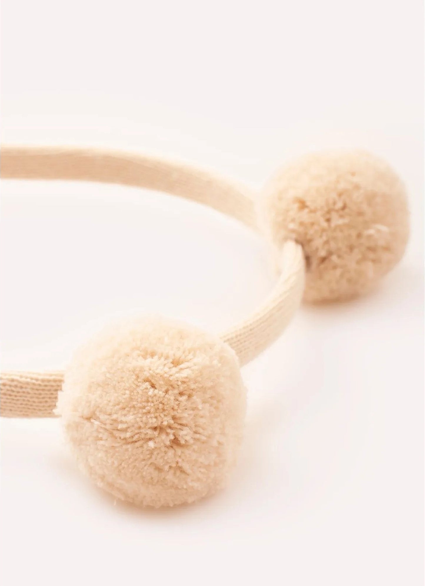 Arco Tricot Pompom