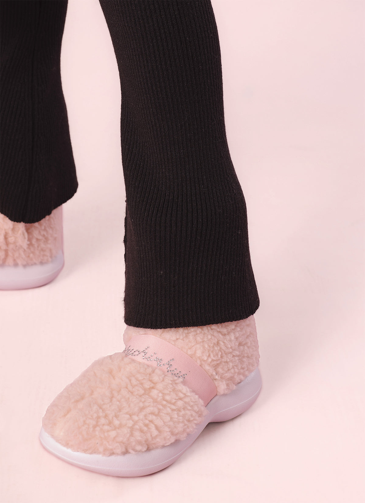 Calça Tricot Canelada Flare