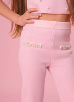 Calça Tricot Flare Brilho Bolsos Fakes Bordados