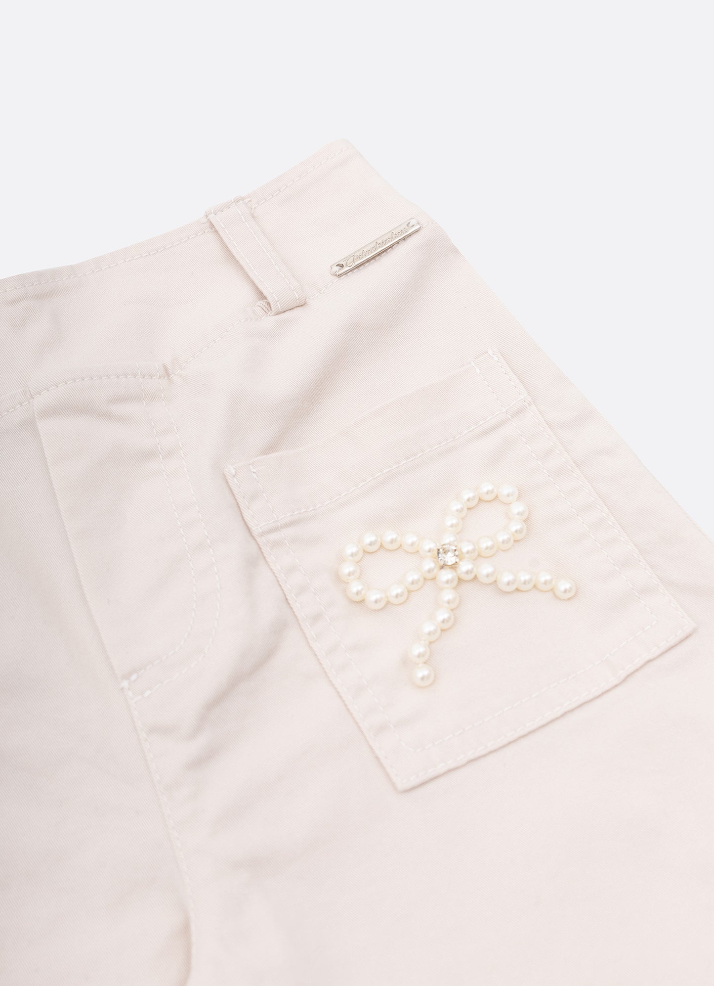 Calça Sarja Reta Laços Bordados