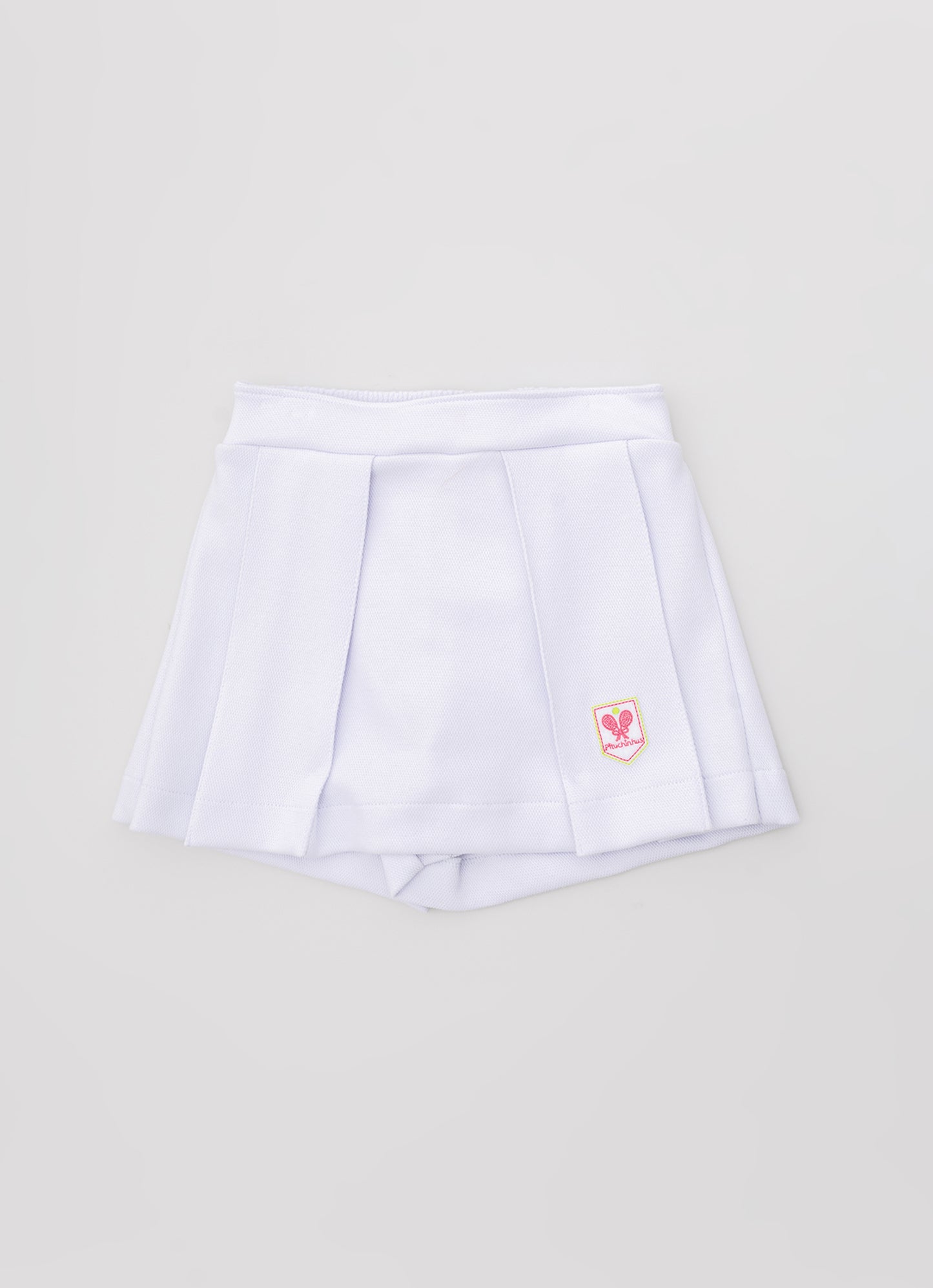 Saia Short Malha Piquet Pregas Patche