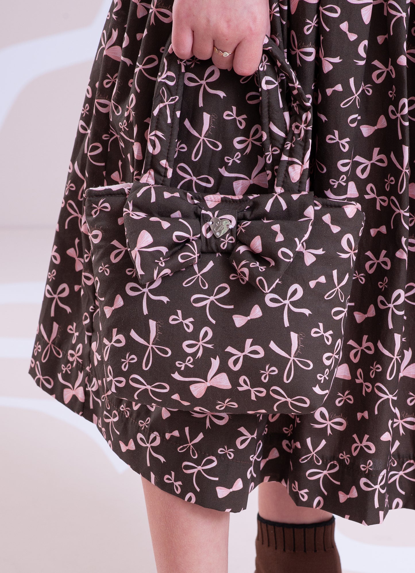 Bolsa Puffer Estampada Laço