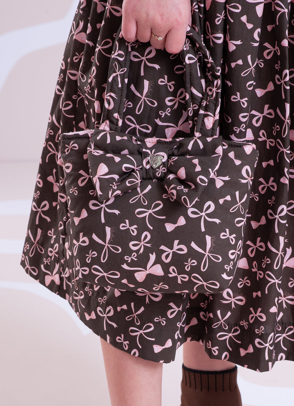 Bolsa Puffer Estampada Laço