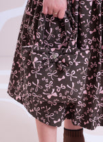 Bolsa Puffer Estampada Laço