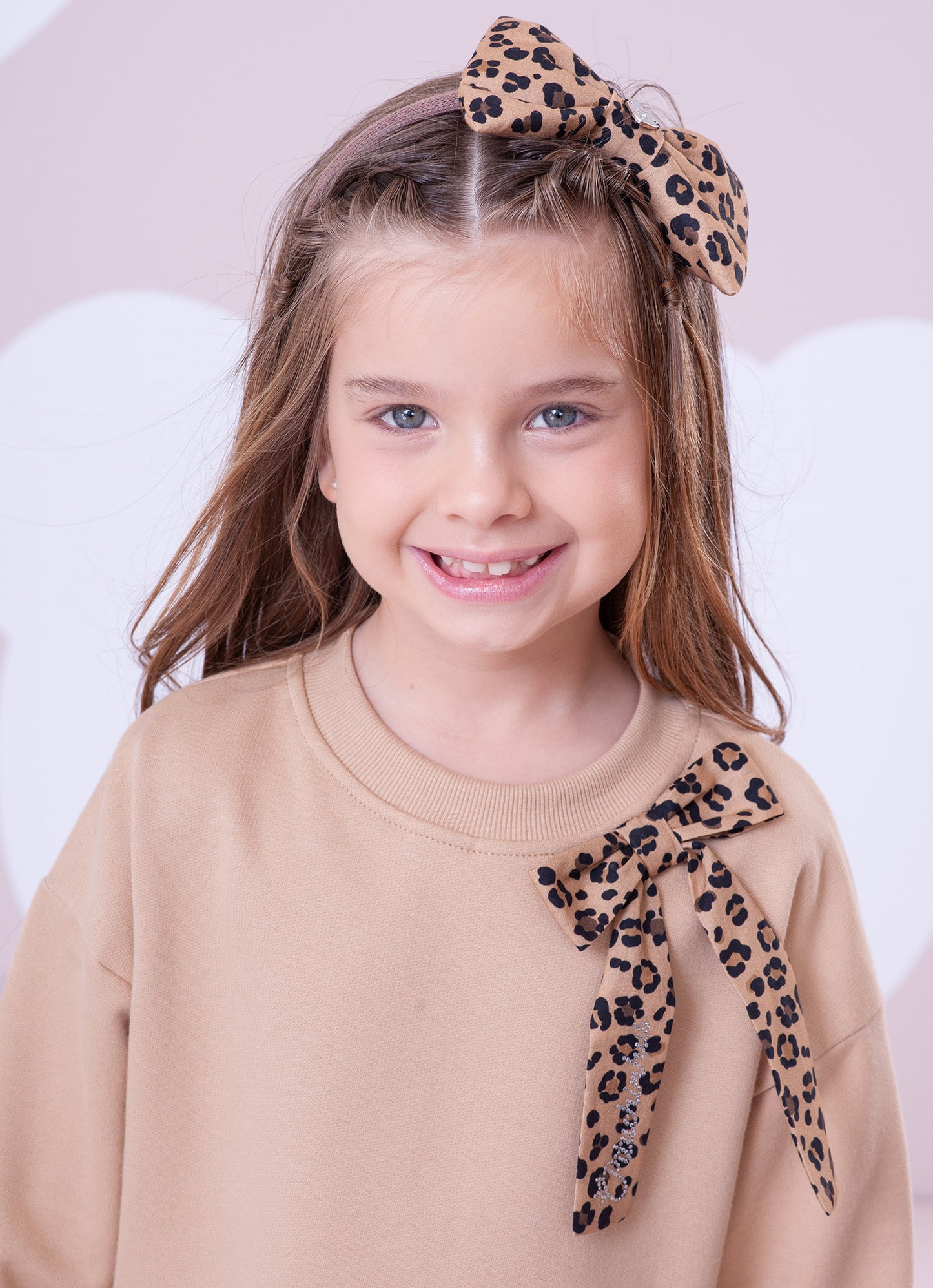 Blusa Moletom Efeito Sobreposição Onçinha Laço