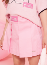 Saia Short Sarja Pregas Patche Barbie